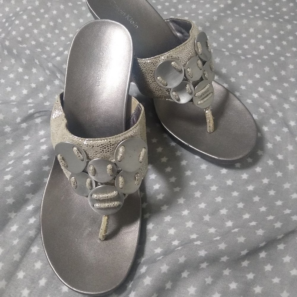 CALVIN KLEIN METALLIC SILVER WEDGE HEELS